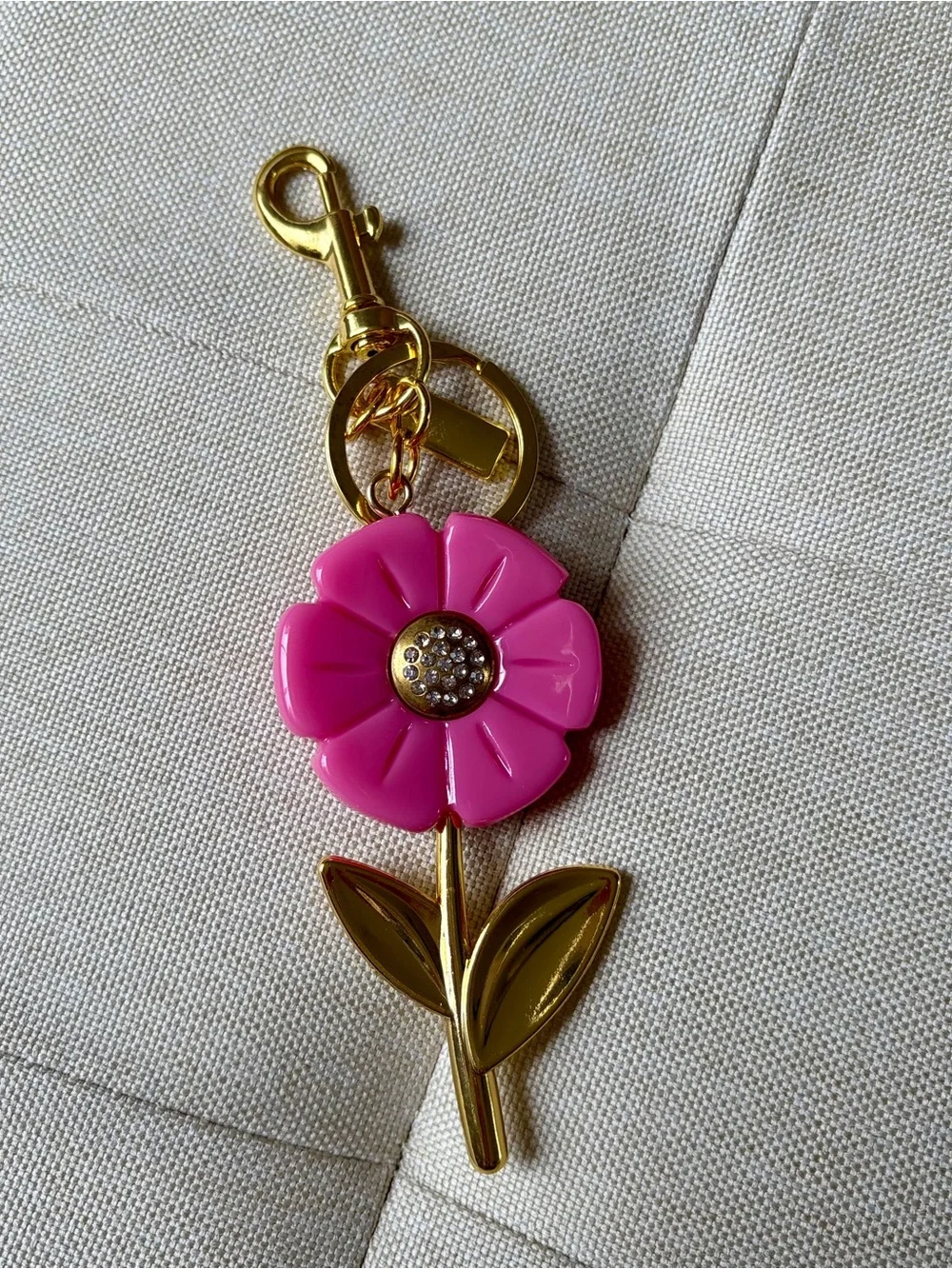 Stylish Pink Flower Keychain with Gold-Tone Stem